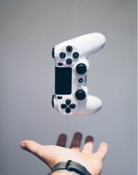 People holding a video-game controller